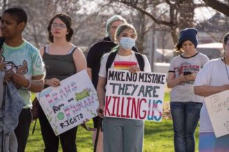 Lgbtq+ youth crisis a trans rights protest outside the kansas statehouse