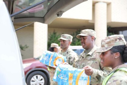 Mississippi national guard soldiers distributes water at the metrocenter mall in jackson, mississippi, sept. 2, 2022. Nearly 20,000 cars received water on the first day of the operation, consisting of seven sites through jackson for people to collect bottled water, hand sanitizer and non-potable water from water buffalo trucks.