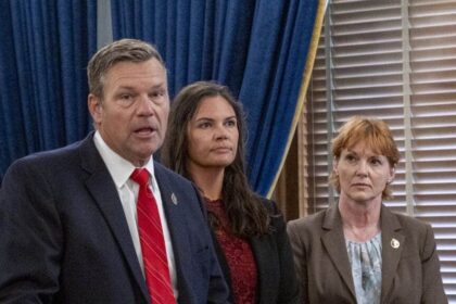 Kansas attorney general kris kobach announces he is suing pfizer during a june 17, 2024, news conference at the statehouse in topeka.