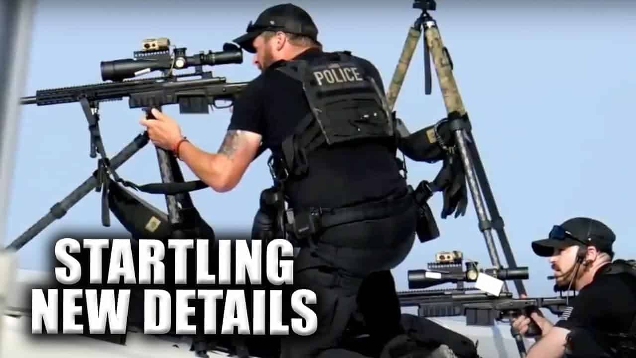 Police snipers on a rooftop