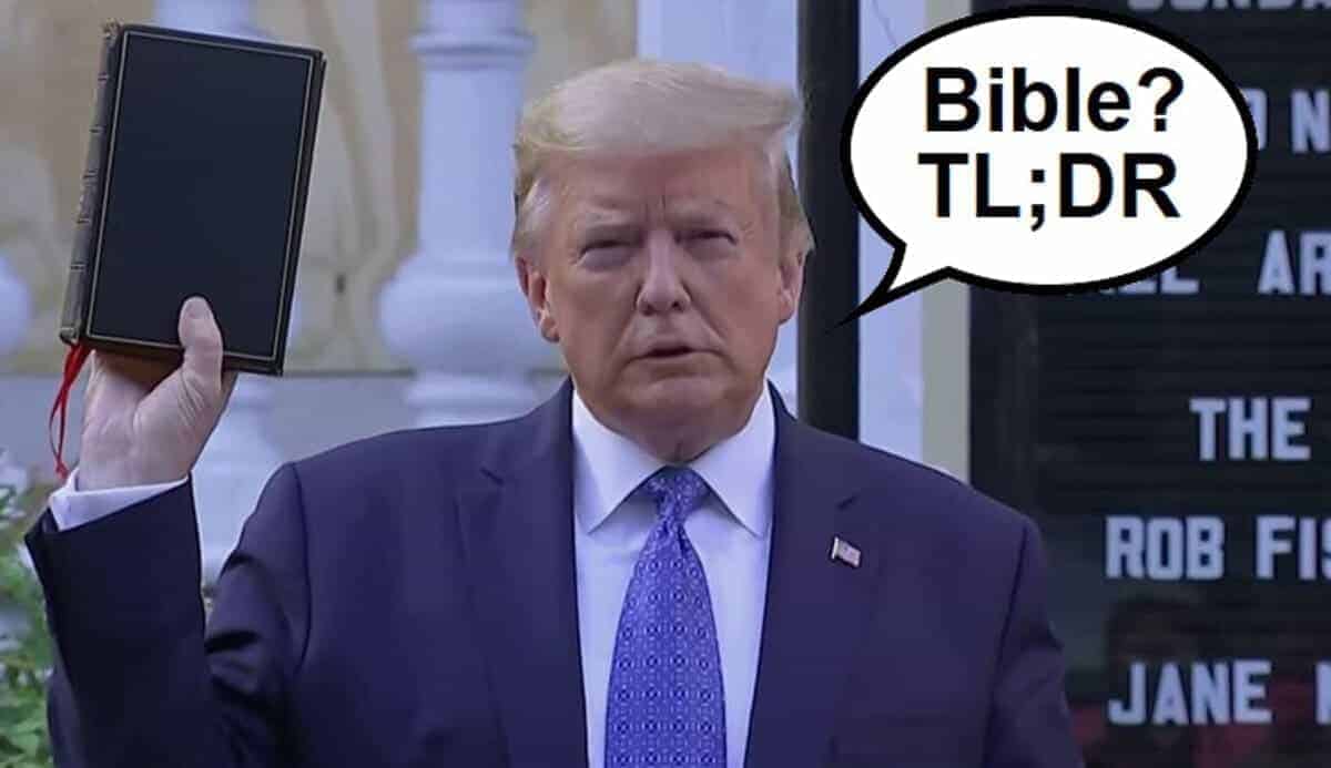 Trump photo in front of a church holding the bible upside down