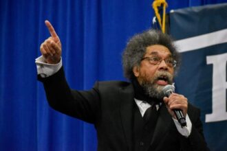 Cornel west campaigning for sen. Bernie sanders in flint, march 8, 2020