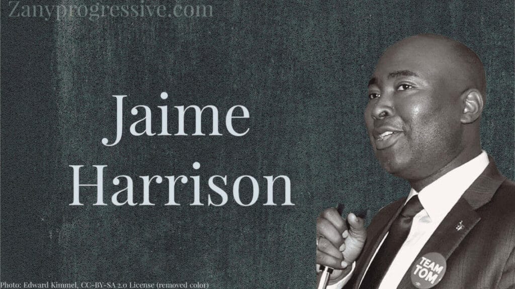 Photo of Jamie Harrison in black and white on a dark gray background