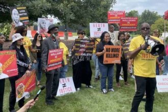 Supporters of marcellus williams rally in favor of his exoneration in shaw park near st. Louis county court in clayton, mo. , on aug. 21, 2024.