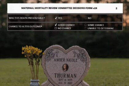 The headstone at amber thurman’s gravesite adorned with her photo, above it is the report from the maternal mortality board that investigated her death on top of the image.