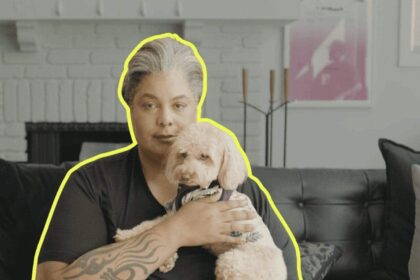 Author roxane gray holding her poodle