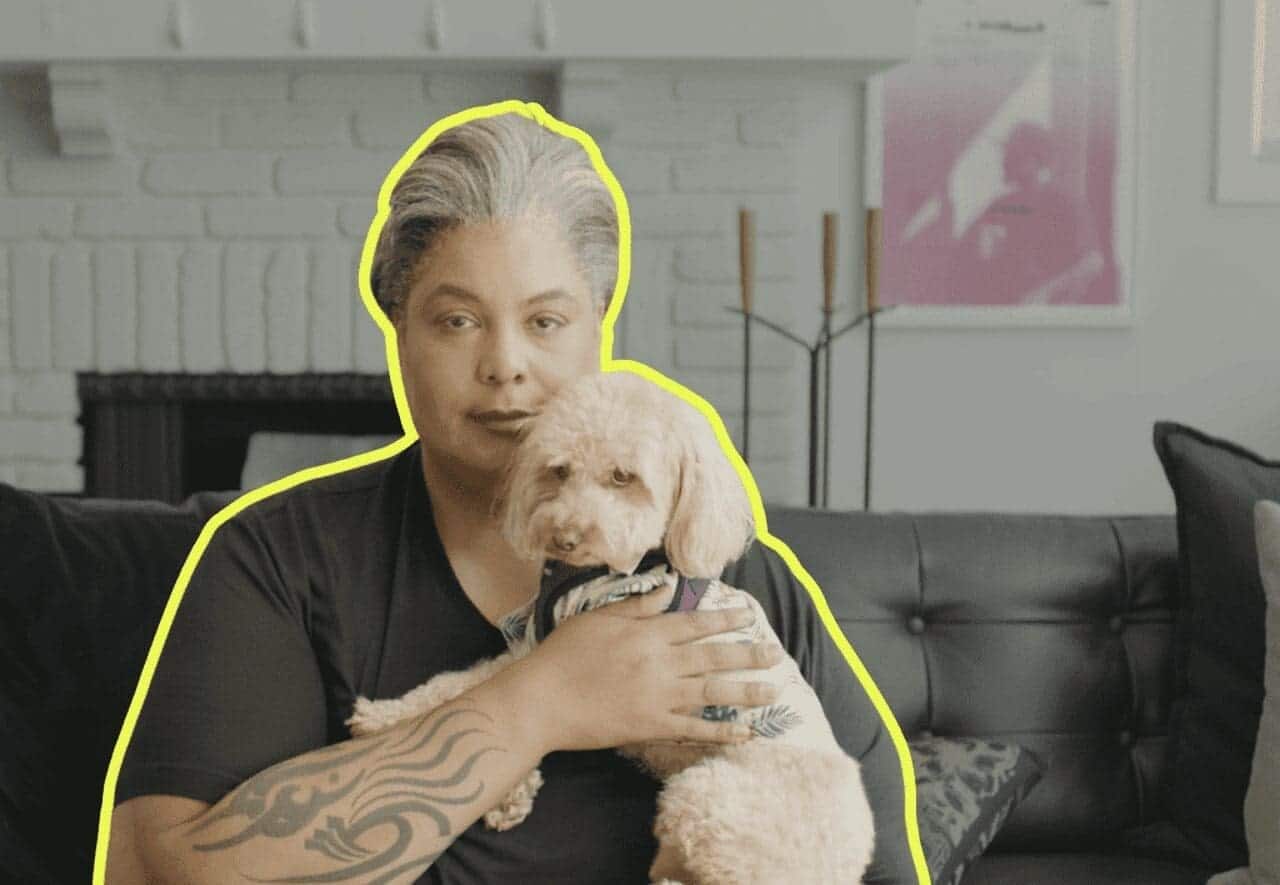 Author roxane gray holding her poodle