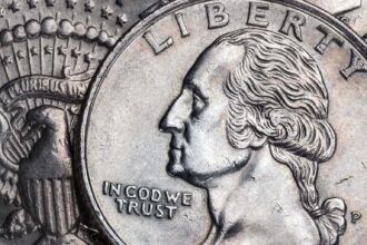 Close up of an american coin with the words in god we trust on it.