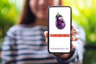 Phone app uses ai to scan for stis a woman holds a cell phone in front of her with the screen facing the camera. A cartoon eggplant emoji looks scared with button underneath begin scan