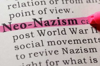 Neo-nazism highlighted in pink on the page of a dictionary