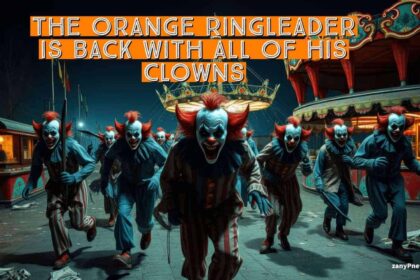 Scary clowns walking towards the camera at a carnival at night