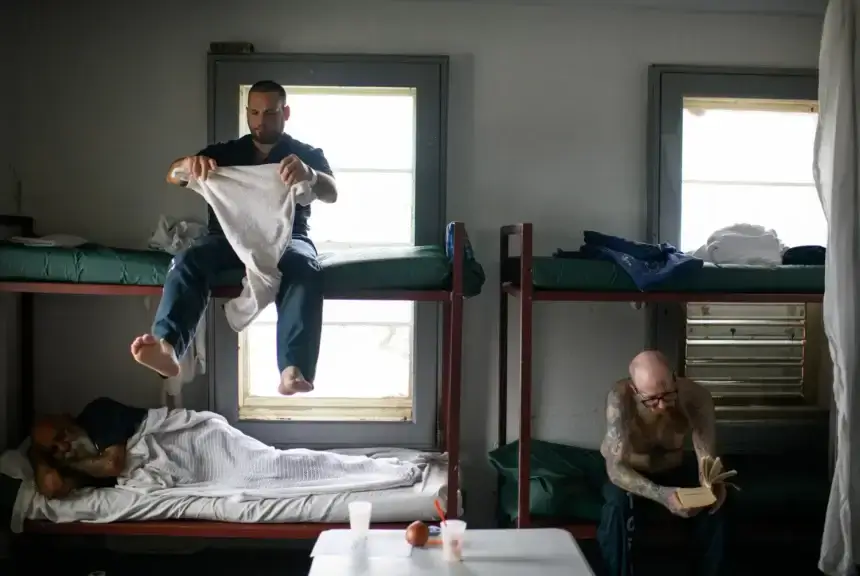 Inmates rest on their bunks on June 4, 2024 in the Trinity County jail in Groveton.