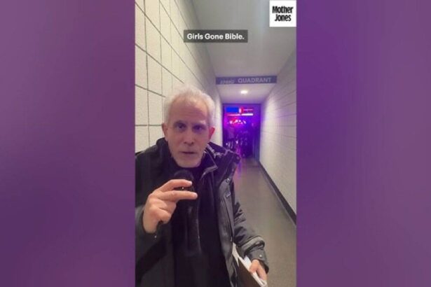 Celebrity speaking to the camera at a Trump rally