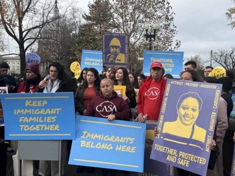 Rashida Tlaib takes part in an immigration protest
