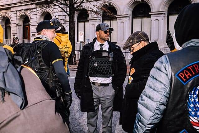 Who counts as a terrorist Proud Boys with leader Enrique Tarrio attend a gun rally.