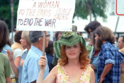 A woman protests at the rnc in miami in the 1970s