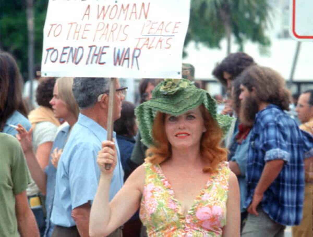 A woman protests at the rnc in miami in the 1970s