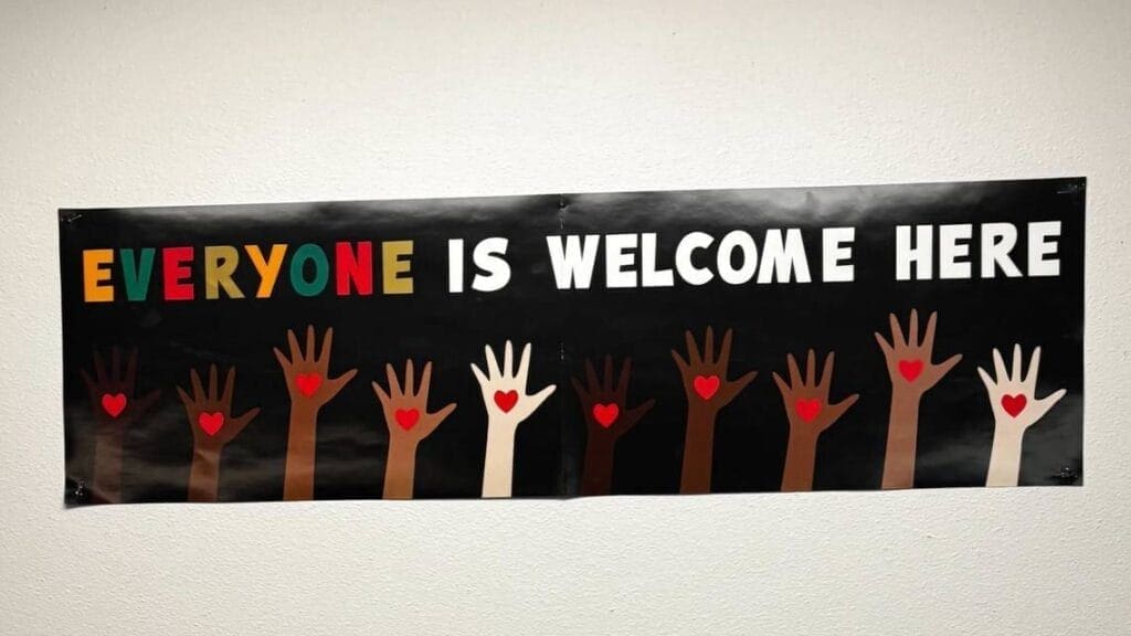 Dehumanizing immigrants is racist. Everyone is welcome here sign in a classroom