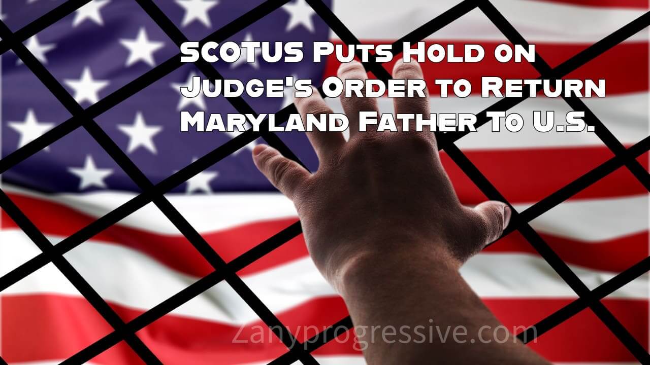 Kilmar abrego garcia represented by a man’s arm reaching towards the american flag from behind a fence.