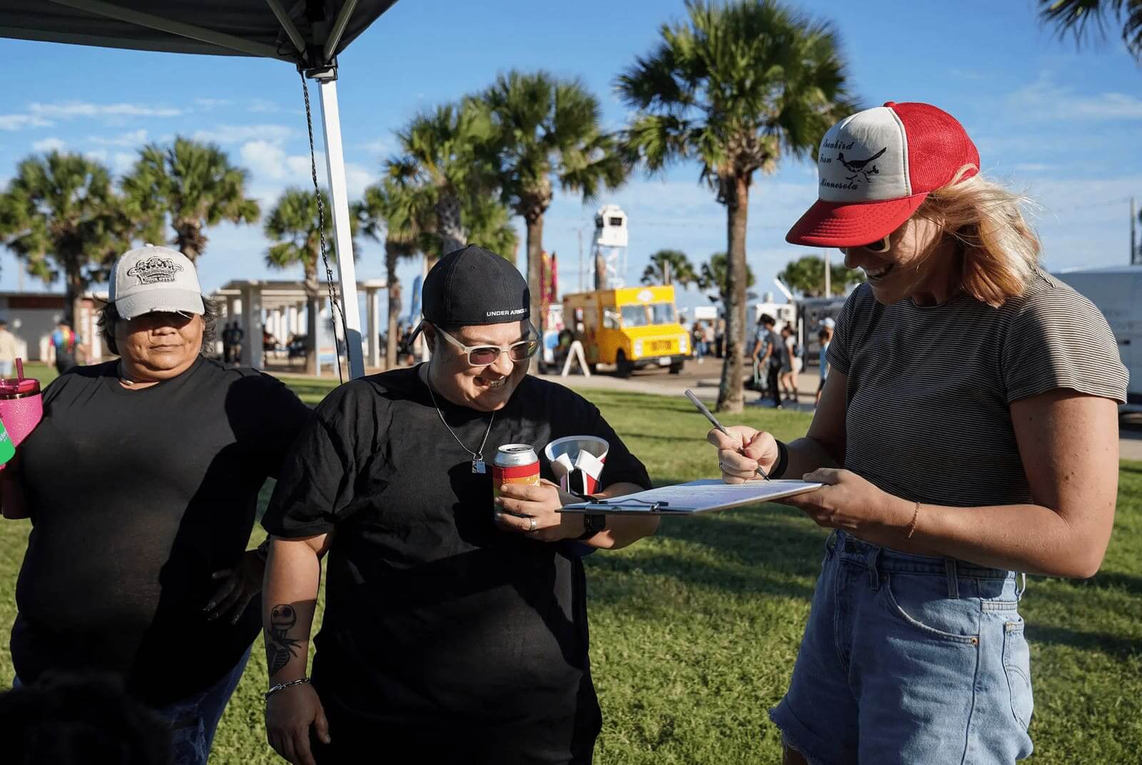 Women registering to vote with a voter registration advocate