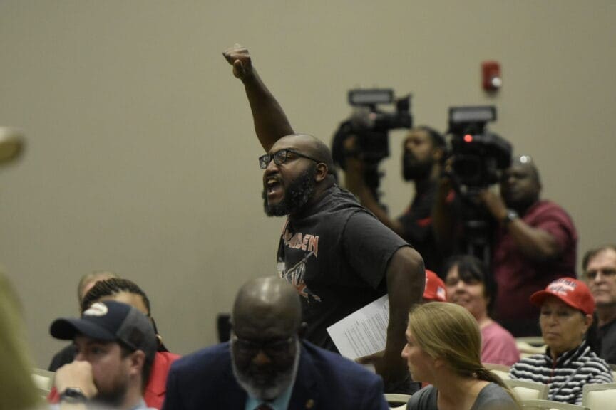 A man shouted FREE KILMAR at the Marjorie Taylor Greene town hall