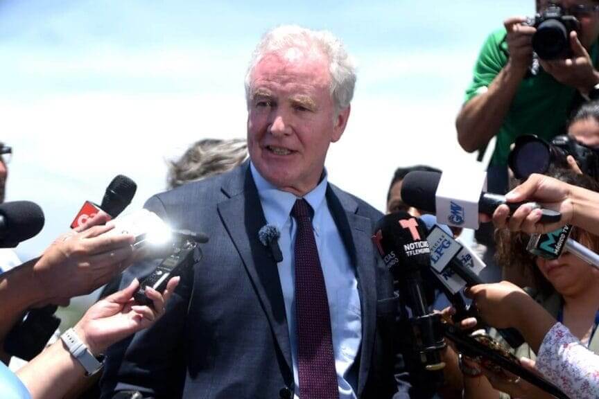 Senator Van Hollen speaking to reporters