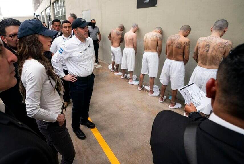 Censorship. Kristi noem looks at cecot prisoners