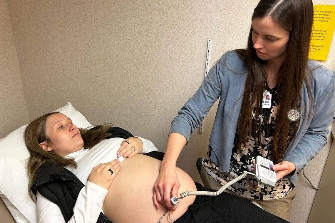 Rural parents like this pregnant woman listening to her baby’s heartbeat