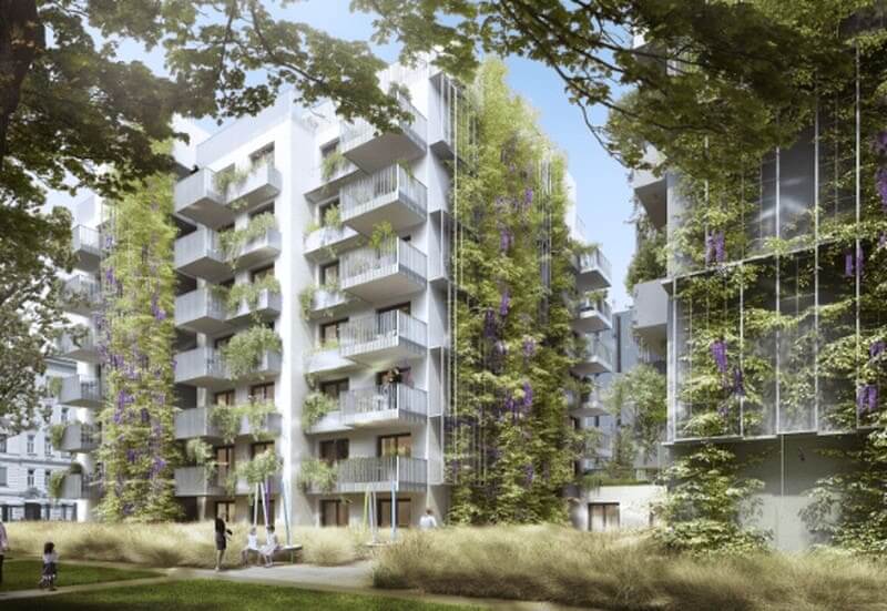 On of the new social housing developments in the wehlistraße 2 in the second disctrict. The outside of the building features multiple hanging plants.