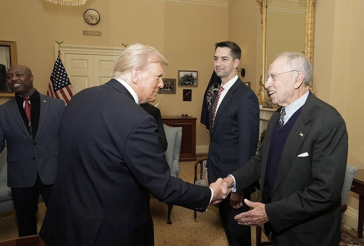 Donald trump and senator chuck grassley shaking hands