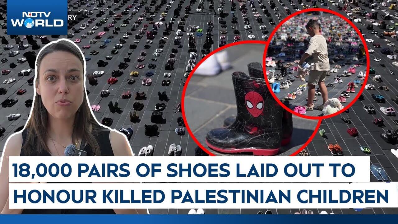 Woman speaking with images of kids laying out 18,000 pairs of children’s shoes representing palestinian children killed in gaza.