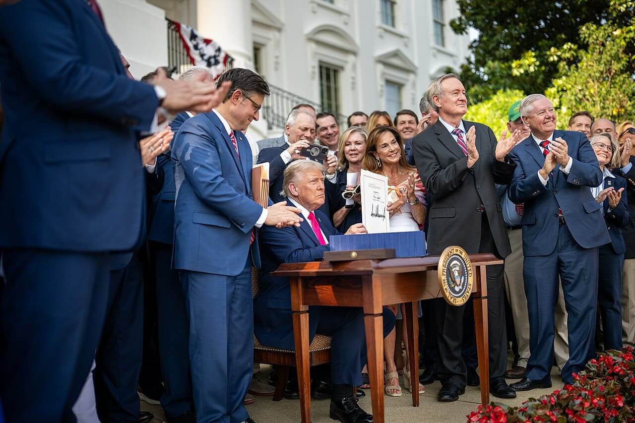 Trump signing the big beautiful bill on july 4, 2025.