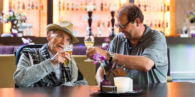 One of the residents enjoying a drink at the restaurant in the village.