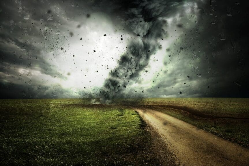 Climate change denialism leads to extreme weather events like this tornado crossing a rural highway