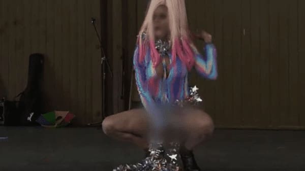 Posey in drag during a performance.