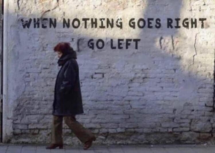 Graffiti on a wall of an inspirational quote