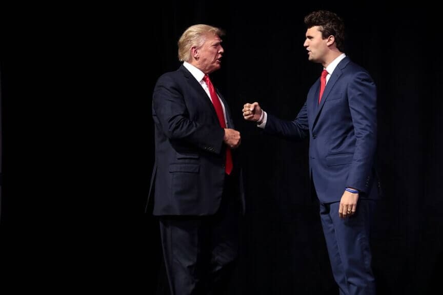 Donald trump and charlie kirk speaking with attendees at the "rally to protect our elections" hosted by turning point action at arizona federal theatre in phoenix, arizona.