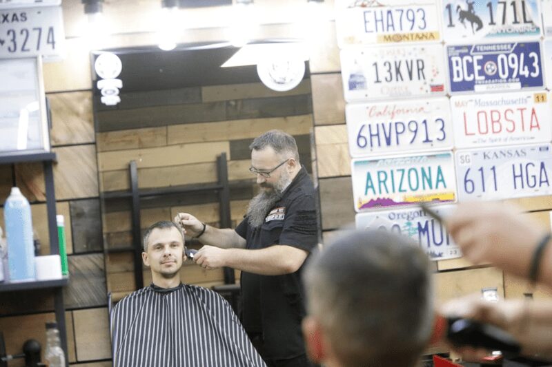 Ukrainian refugee getting a haircut