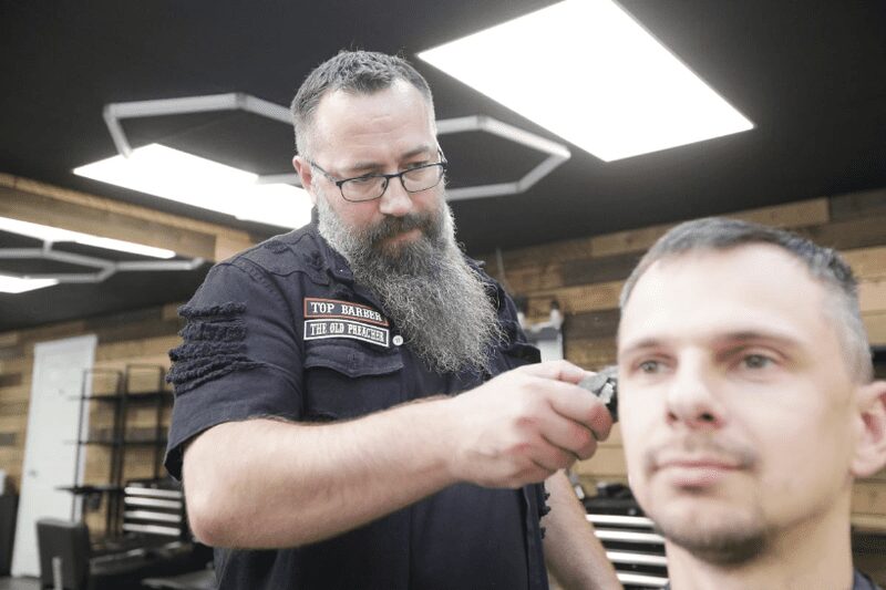 Ukrainian refugee getting a haircut