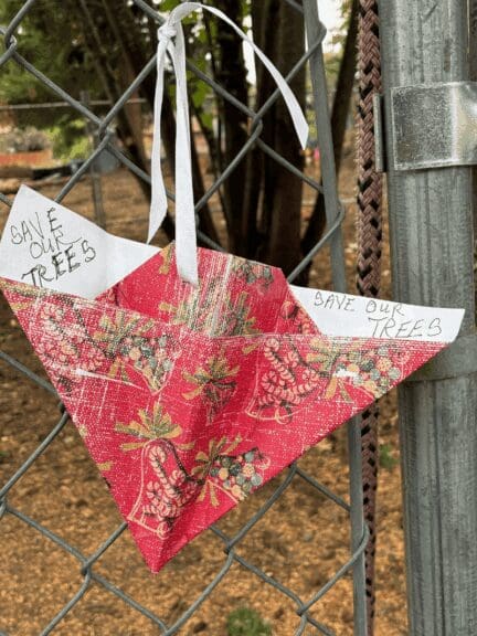 Save our trees sign promoting tree protection ordinance