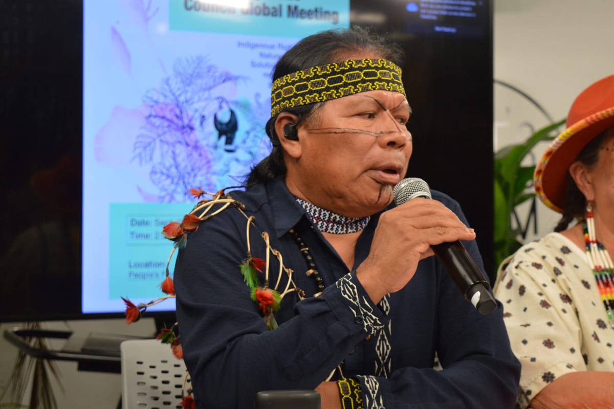 José gualinga speaking at an event
