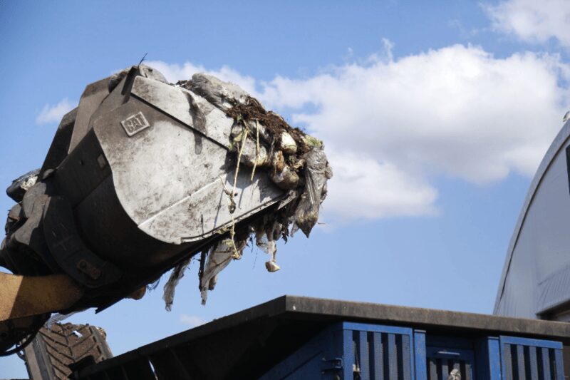 trash dump Claw machine at a composting facility