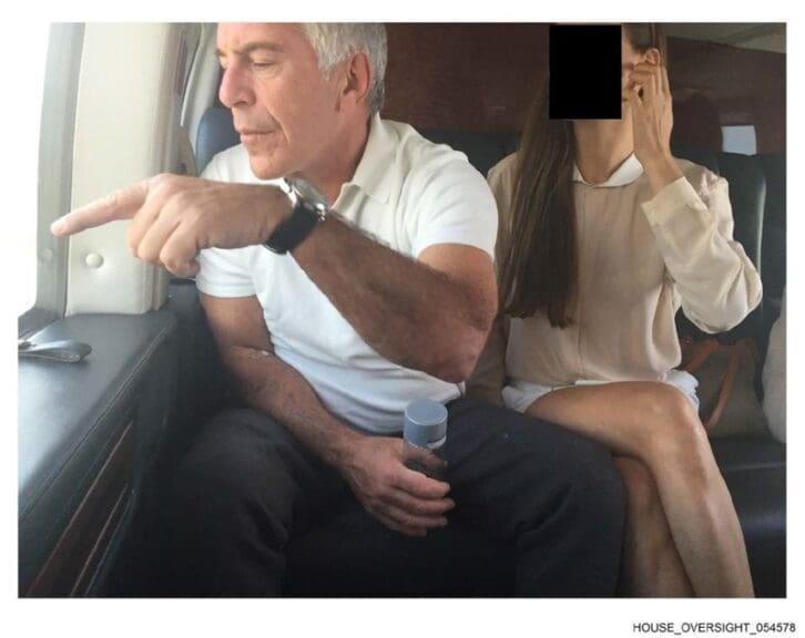 New epstein photos epstein with a woman/girl
