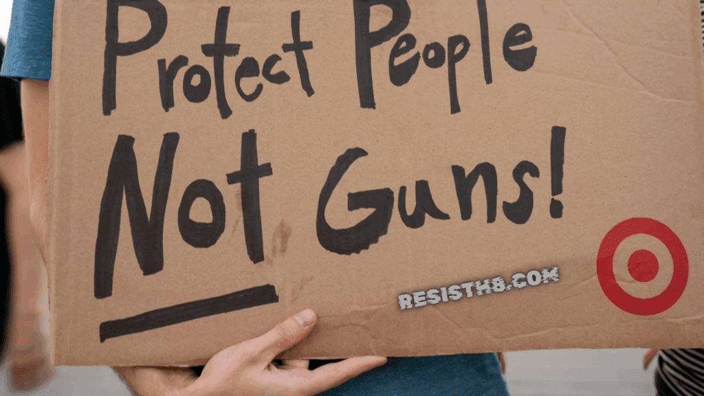 Terror attacks brown university search for the shooter. Protest sign that says protect people not guns