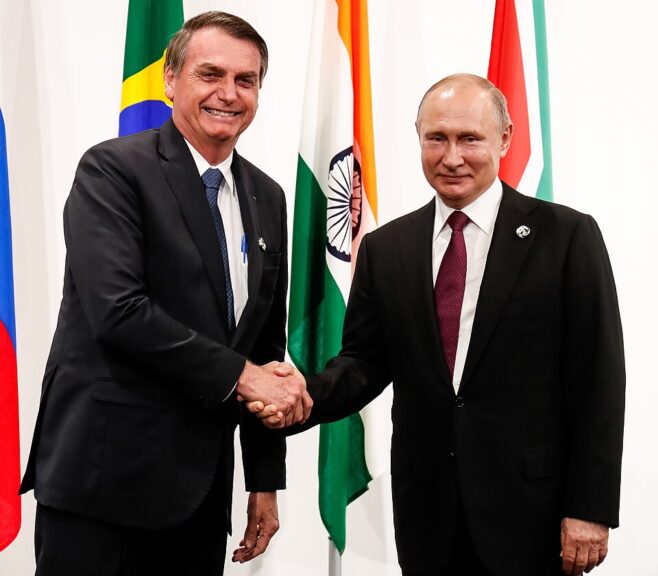 Bolsonaro and putin shaking hands. Tariffs out on brazil were part of why there were corporate bankruptcies.