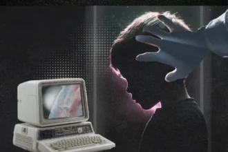 Young boy looking at a computer screen trans terrorism panic