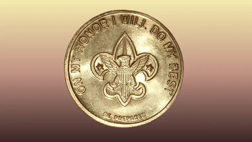 Gold coin with boy scouts logo and pledge