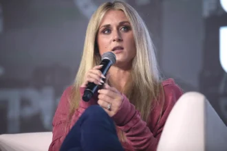 Swimmer riley gaines speaking at an event