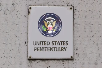 Sign that says united states penitentiary
