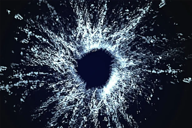 Gun laws by country image of a bullet hole in glass